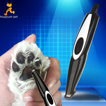 Hoopet Pet Grooming Trimmer being used to trim fur around a dog's paw.