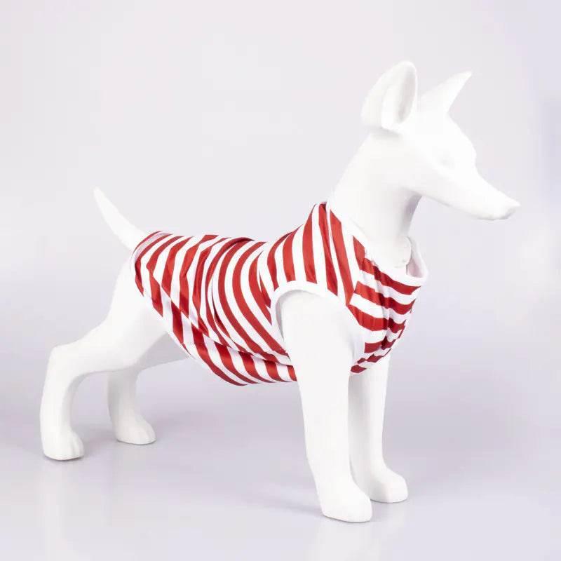 White dog mannequin wearing red and white striped pet shirt, ideal for dog fashion and comfort.