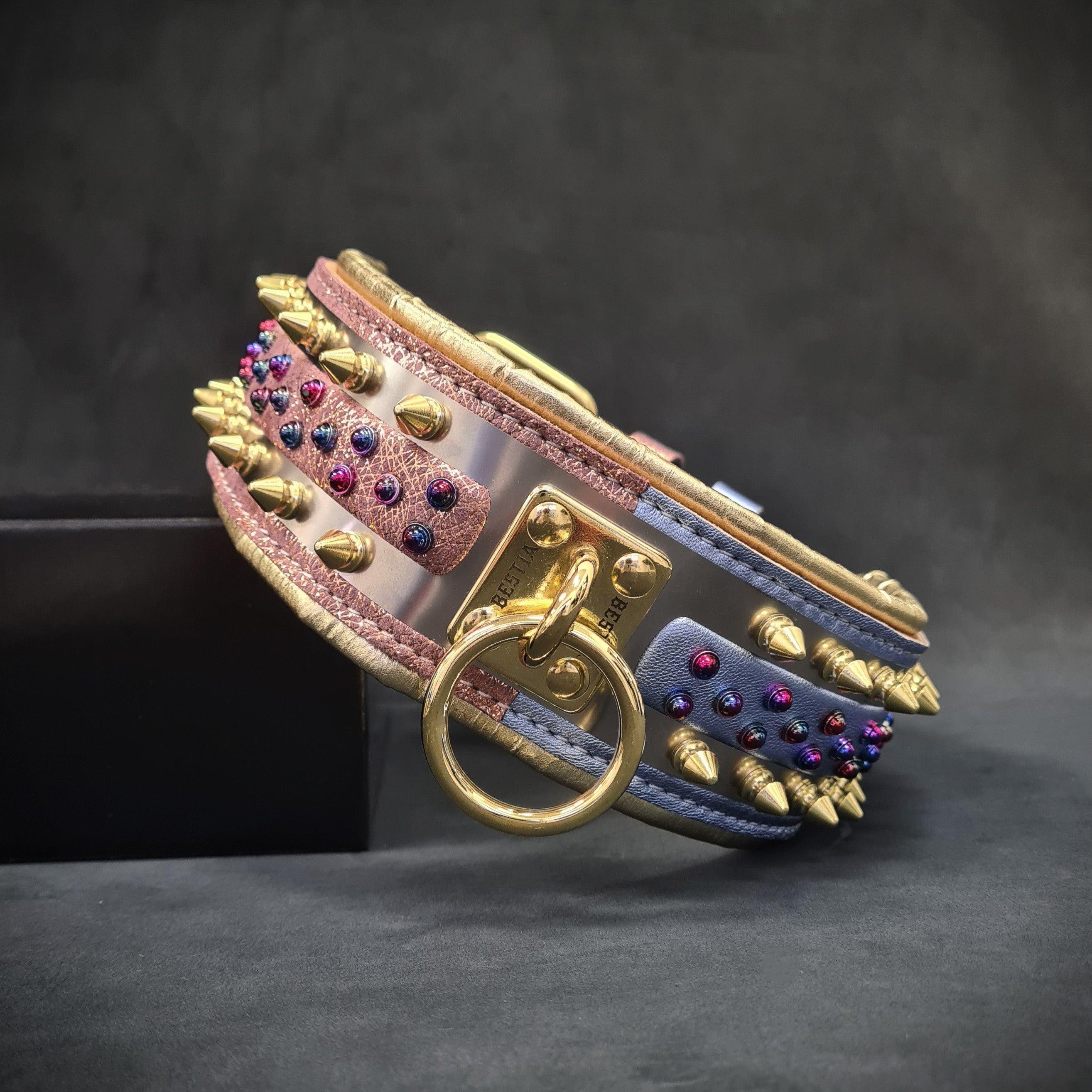 Luxury dog collar with gold spikes, colorful gems, and leather straps for stylish pet accessories.