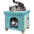 Teal cat condo with scratcher and toy, featuring two cats lounging and playing inside pet furniture