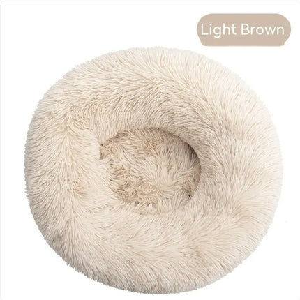 Light brown plush round washable pet bed for dogs and cats.