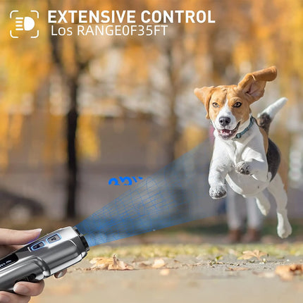 Portable ultrasonic dog repeller emitting a control beam towards a running beagle dog.
