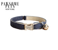Denim cat collar with gold bell and buckle, Pawsome Pets New York branding