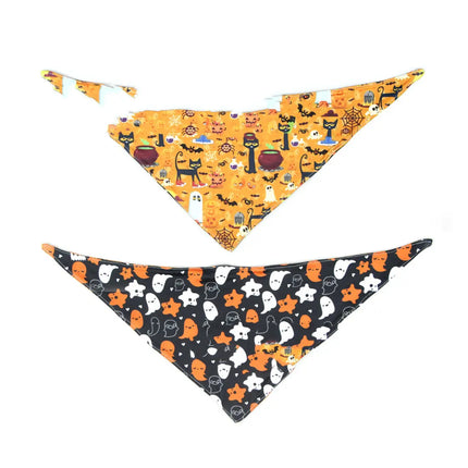 Double-sided Halloween pet bandana with orange pumpkin and black ghost patterns.
