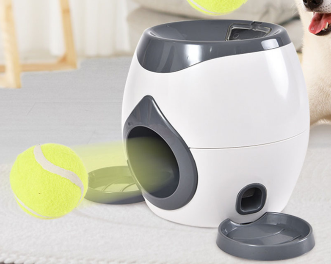 Interactive dog toy launcher with tennis balls for playful pets at home