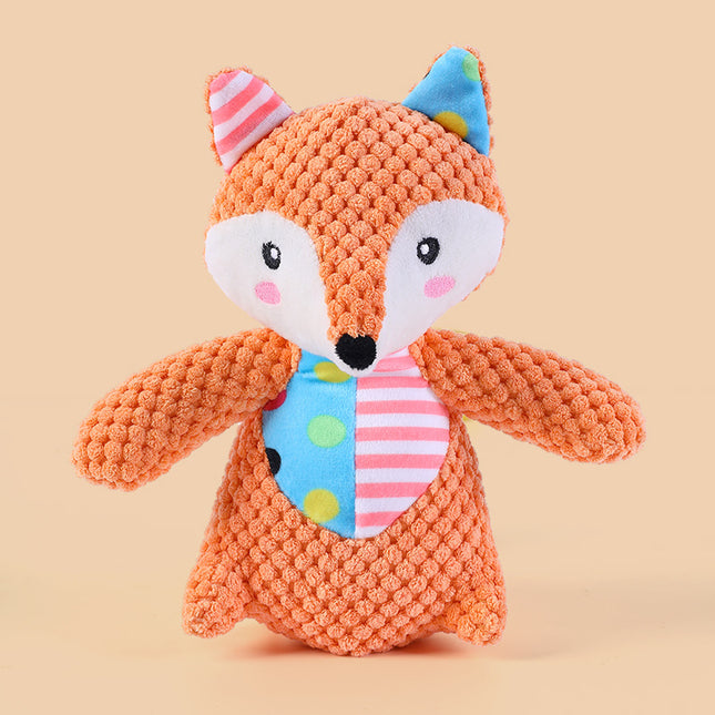 Orange textured plush fox toy with colorful patterned ears and belly.
