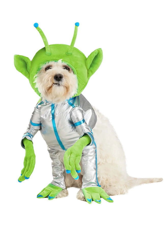 Small white dog wearing a green alien costume and silver spacesuit from Nai Pet Store