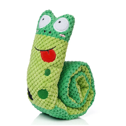 Green plush caterpillar dog toy with a red tongue and large eyes