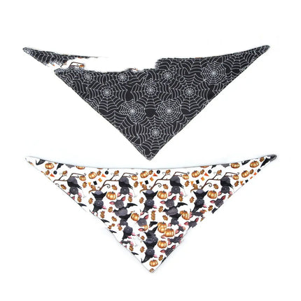 Double-sided Halloween pet bandana with spiderweb and bat pumpkin patterns.