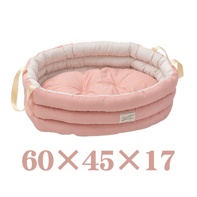 Soft pink pet bed with cozy cushion, ideal for dogs and cats, dimensions 60x45x17 cm