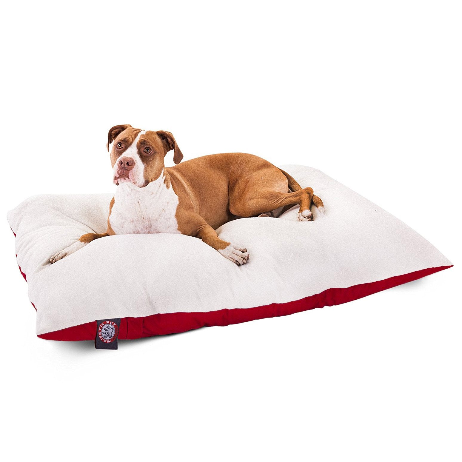 Brown and white dog resting on a white and red orthopedic dog bed for comfortable pet sleep
