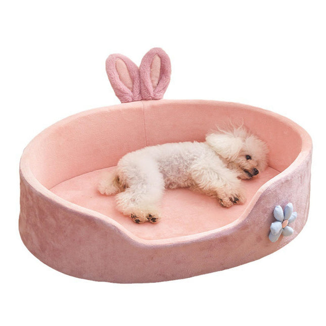 Pink bunny ear pet bed with flower detail, cozy for small dogs or cats