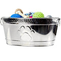 Stainless steel dog toy bin with paw print design, holding colorful chew toys and bones for pet storage