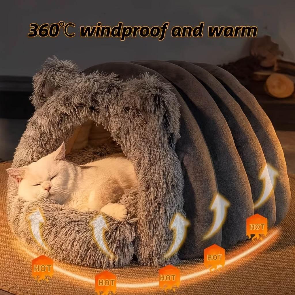 Cozy cat sleeping in windproof, warm 360° pet bed with plush fur and heat circulation design