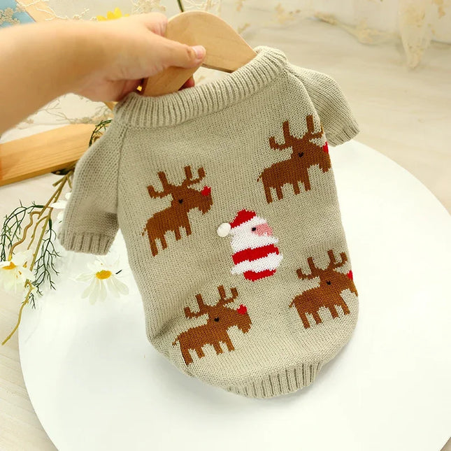 Cozy pet sweater with reindeer and Santa print, perfect for festive dog or cat outfits.