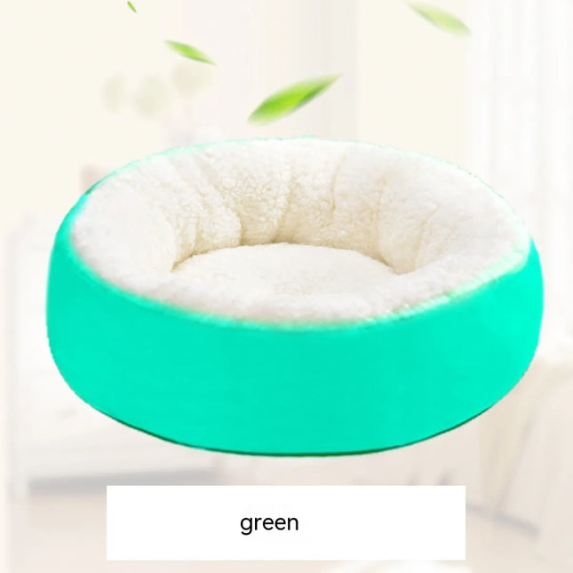 Green pet bed with plush white interior for dogs and cats, cozy and comfortable pet accessory