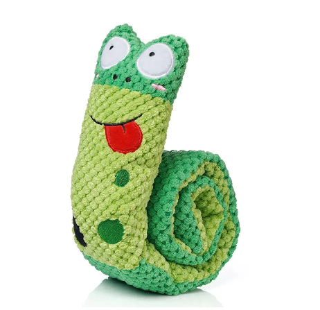 Green plush frog dog toy with large eyes and red tongue on a white background.