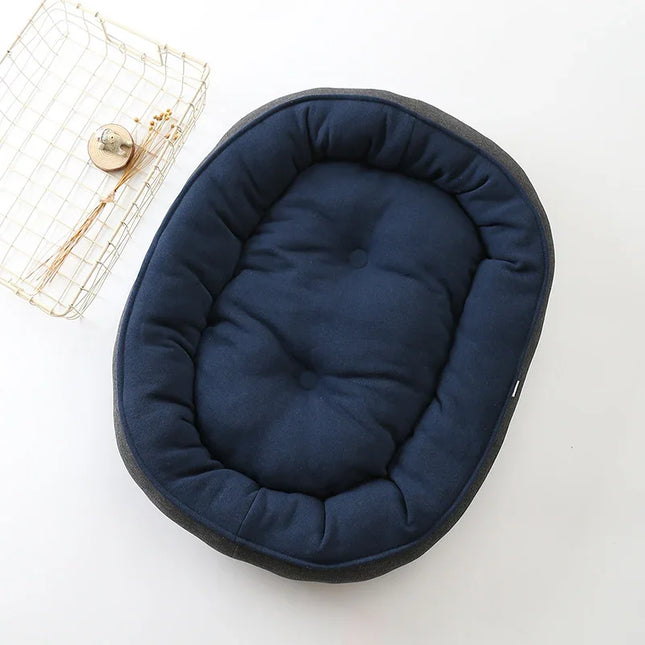 Cozy navy blue pet bed with tufted design, perfect for dogs and cats